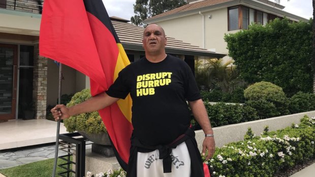Climate protester holds smoking ceremony outside Woodside board member’s Perth home
