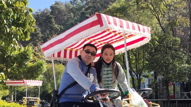  Xiaoliang Yuan says she just wants her husband home safely.