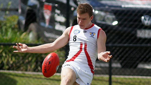 Mitch Maguire was named Canberra Demons' best-and-fairest.