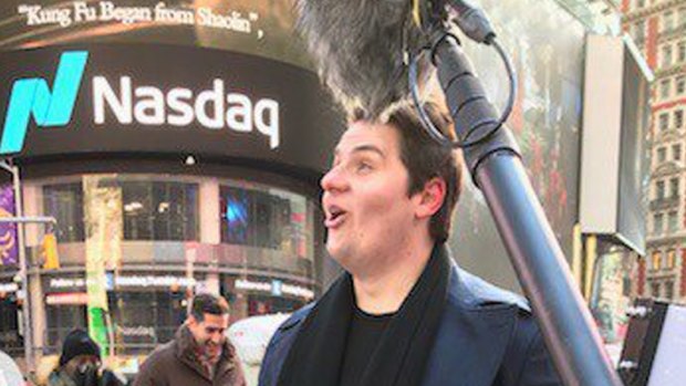 Big Un founder Brandon Evertz reacts as he sees a Big Review TV ad in Times Square in 2017.