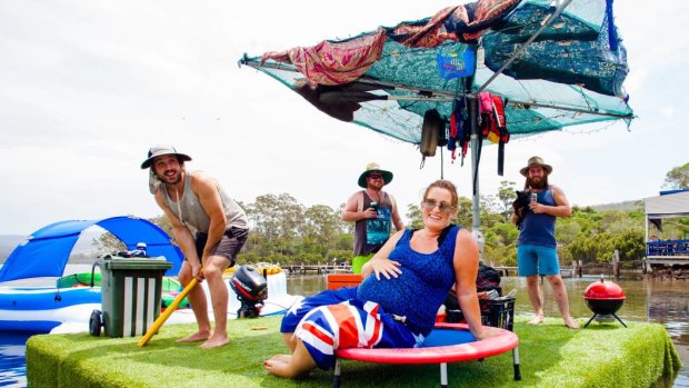 Howzat a floating backyard. Merimbula local Chelsea Grabham with her inventive mates Mick and Phil Jacob relax on deck while Jake Webster has a hit of cricket.