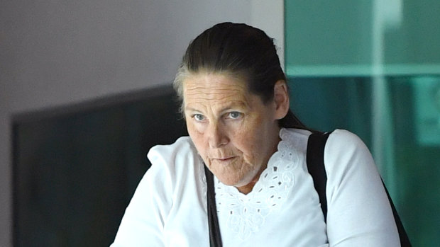 Witness Theresa Flynn is seen leaving the Brisbane Coroners Court in Brisbane on Friday. 