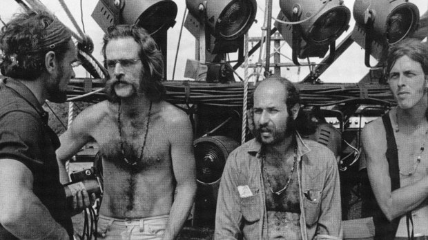 Lighting director and MC of Woodstock Chip Monck, second from the left, during the construction of the stage. 