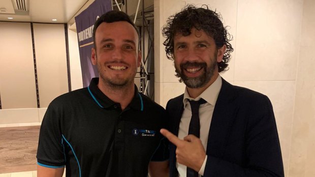 Former Roma captain Damiano Tommasi (right) catches up with ex-Wanderer  Mark Bridge. 