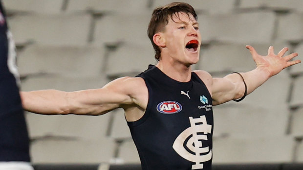 Sam Walsh celebrates his crucial final term goal against Collingwood on Sunday. 