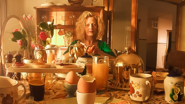 Mother at breakfast, a still from <i>The Door in Question</i>, by  Stephanie Peters.