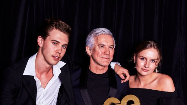 Baz Luhrmann with young stars Austin Butler - cast as Elvis Presley - and Olivia DeJonge - cast as Priscilla Presley. 