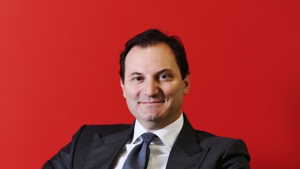 Only the background is red: Origin Energy CEO Frank Calabria says the company has now returned to profit.
