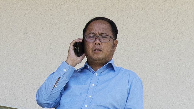 Huang Xiangmo on the balcony of his former Mosman home.