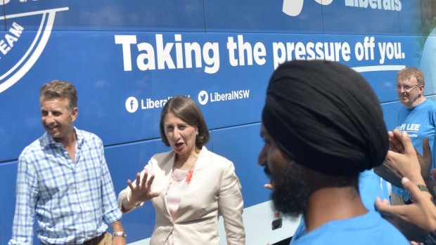 Premier Gladys Berejiklian and Transport Minister Andrew Constance arrive at Westmead train station to announce an extra $3.4 billion on the Metro West if she wins this month's election. 