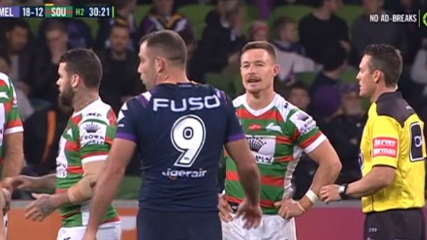 Score to settle: Souths hooker Damien Cook stares down his opposite number Cameron Smith.