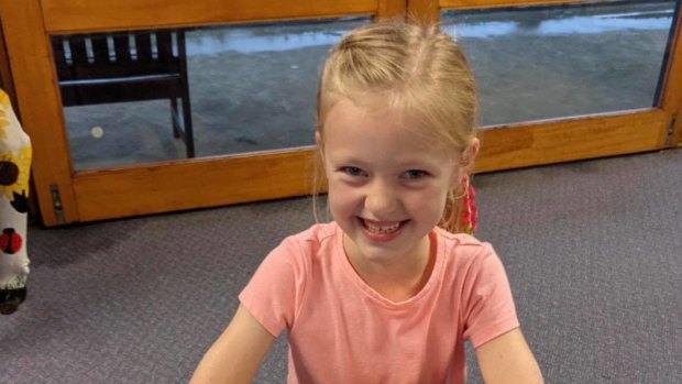 Jordan Marden stranded at her school due to floodwaters on her 7th birthday. 