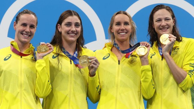 Bronte Campbell, Meg Harris, Emma Mckeon and Cate Campbell of Team Australia pose after winning the gold medal in the Women’s 4 x 100m Freestyle Relay Final.