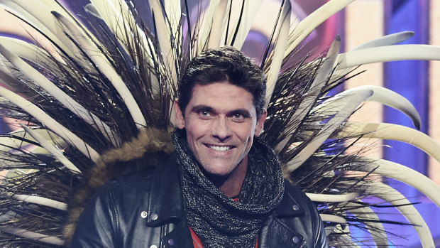 Former tennis star Mark Philippoussis is unmasked on The Masked Singer Australia.