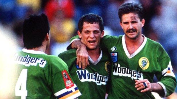 Raiders hooker Steve Walters celebrates the '89 premiership with Gary Belcher and Laurie Daley.