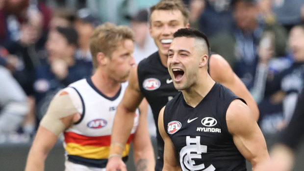 Carlton's Michael Gibbons celebrates his goal during the Blues' 27-point win against Adelaide. 
