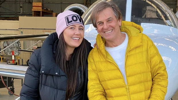 Andrew Norbury (right), widely known as the husband of Real Housewives of Melbourne star Lydia Schiavello (left), in front of the same kind of jet at issue in the lawsuit. 
