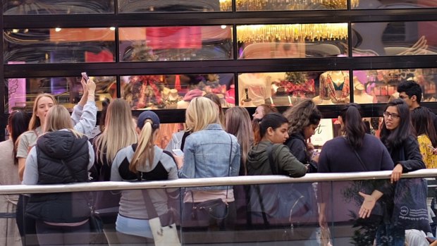 Women line up in wait for the opening of the new Victoria’s Secret store in Chadstone.