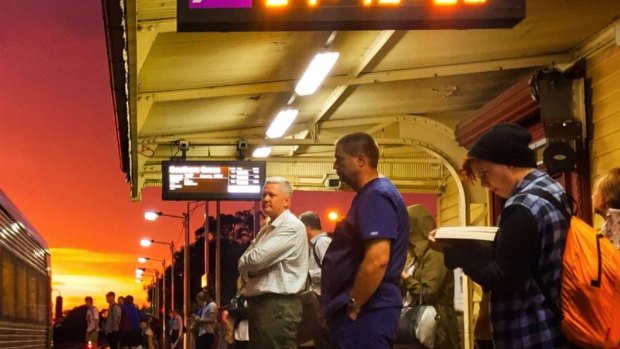 Commuters waiting at Gisborne station for a V/Line train from Bendigo. New longer new trains are too long for the platforms at some older stations.