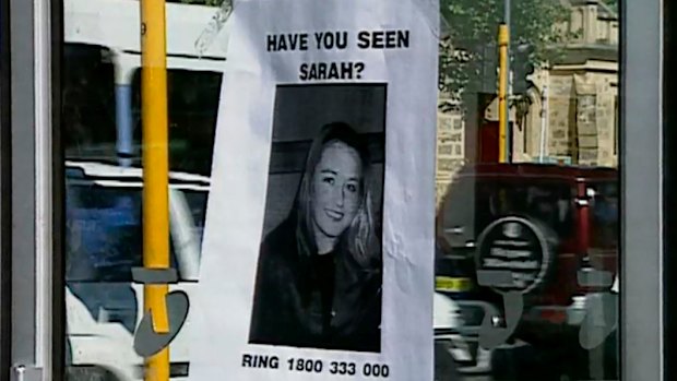 A missing person poster on the public phone booth where Sarah Spiers called for a taxi before she vanished. 