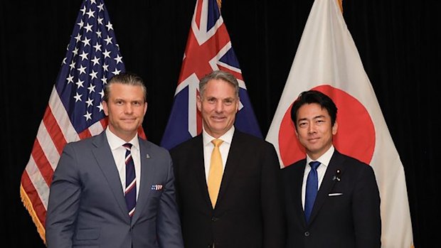 Defence Minister Richard Marles (centre), with US Defense Secretary Pete Hegseth and Japanese Defence Minister Shinjirō Koizumi meet in Singapore on May 30.