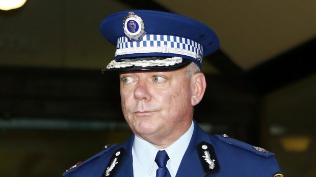 Assistant Commissioner Mark Jenkins leaves Downing Centre Court after giving evidence at the Lindt cafe siege inquest.