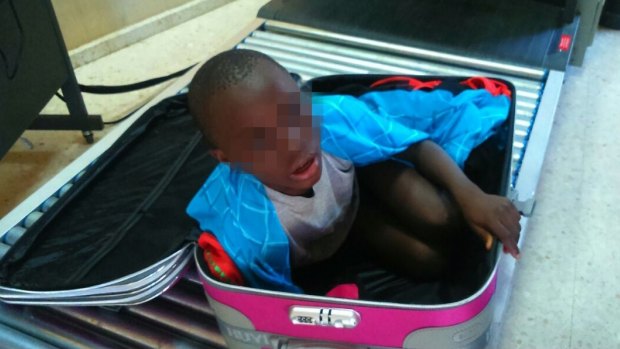 The Ivorian boy was carried in a suitcase by a young woman for about three hours before she was taken to border security authorities in Ceuta.