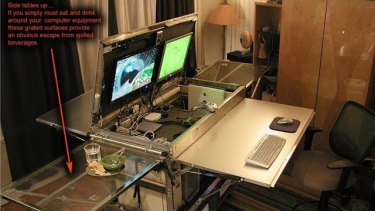 A kitchen table becomes a high-tech work desk.