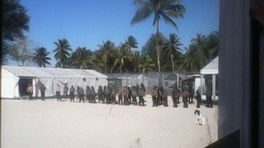 Security staff entering Delta compound on Manus Island detention centre.