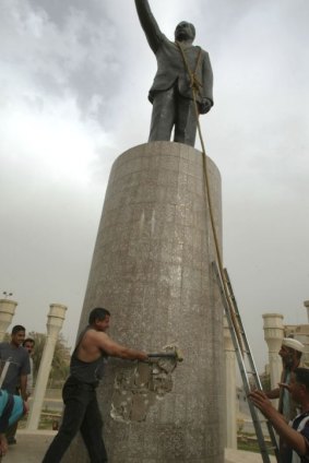 Kadhim Sharif al-Jabouri took a sledgehammer to Saddam's statue.