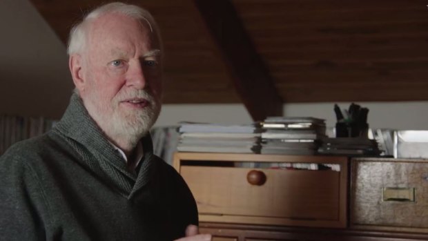 David Stratton in his home office in a scene from the film. As a young man he rebelled against his upbringing, refusing to return to Britain to work in the family grocery business. 