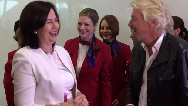 Queensland Premier Annastacia Palaszczuk - who received a kiss on her hand from the charismatic business leader - scoffed at suggestions she may have felt miffed at being called one of the girls on the stage.