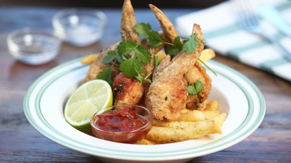 Spicy pork stuffed chicken wings, chilli jam, chips and green laver at Oratnek in Redfern. 