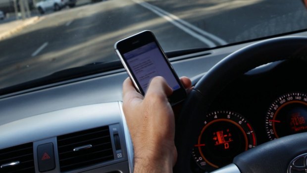 Police issued more than 1,200 infringements in one day to people using their phone while driving.