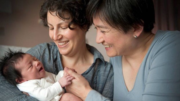 Penny Wong and partner Sophie Allouache after the birth of their daughter Alexandra in 2011.