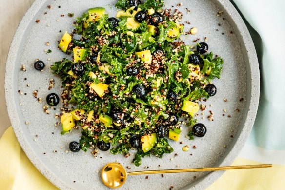 Kale, quinoa and blueberry salad with coconut dressing.