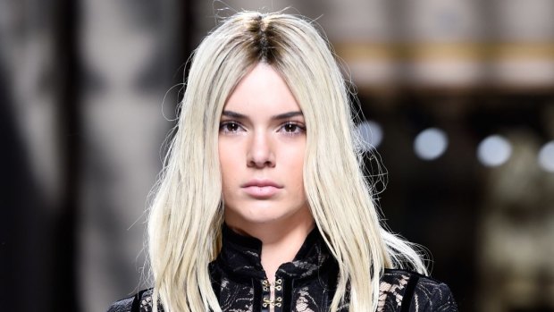 Kendall Jenner rocks platinum blonde hair during the Balmain show at Paris Fashion Week on Thursday.