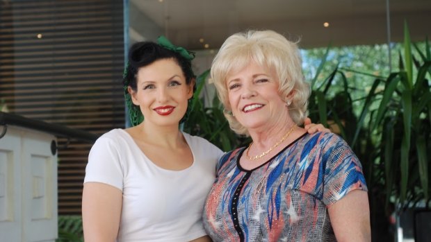 American burlesque legend Dusty Summers (right) with Canberra public servant and burlesque dancer Harley Quinn in Canberra on Friday.