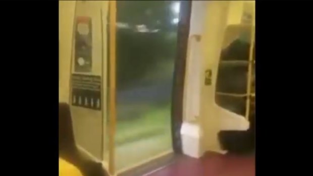 A passenger filmed their train travelling with the doors open.