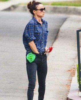 Juliette Lewis has responded to a paparazzi photo of her with her hand down her pants.