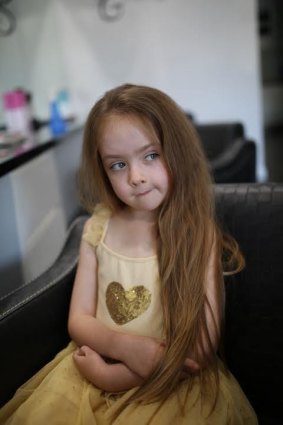 Kayley Bencke, 7, had her hair cut off for charity.