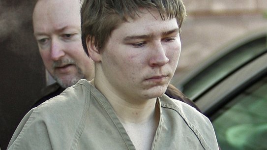 Conviction overturned: Brendan Dassey is escorted out of court in 2006.