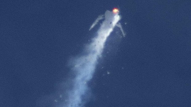 The Virgin Galactic SpaceShipTwo rocket explodes in mid-air during a test flight above the Mojave Desert in California. 
