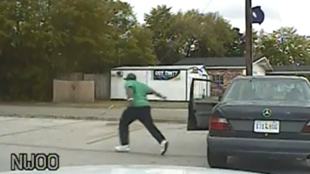 An image taken from a police dash camera shows Walter Scott running from his vehicle just before he was shot and killed by a policeman in South Carolina in April.