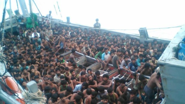 A boat packed with 727 migrants was intercepted off Myanmar's south coast on Friday.
