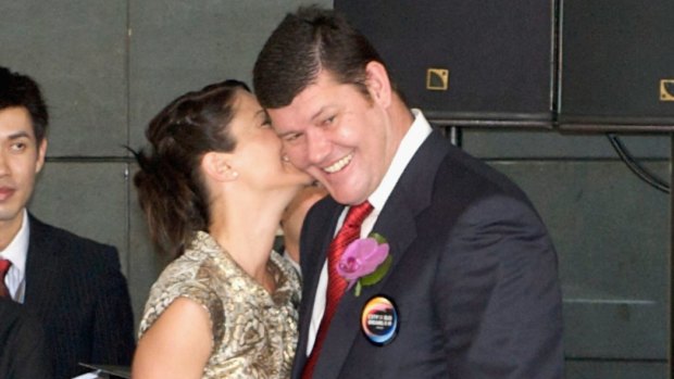James Packer and his ex-wife Erica (seen here in happy times) have been photographed embracing at the Sydney International Airport.