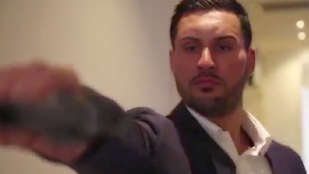 In a dramatic scene from the pre-wedding video, Salim Mehajer is depicted firing a gun. 