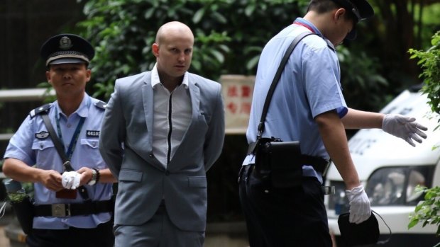 Peter Gardner, being tried on drug smuggling charges, arrives at Guangzhou Intermediate Court.