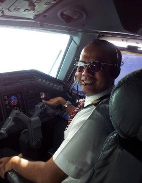 Tommy Abu Alfatih in the cockpit of a plane.