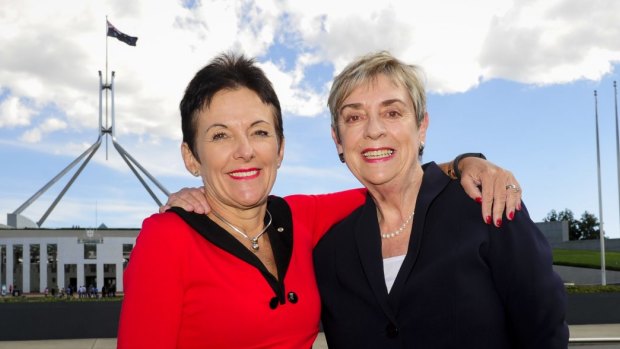Former chief ministers Kate Carnell and Rosemary Follett outside Parliament House, 20 years after their election face-off.